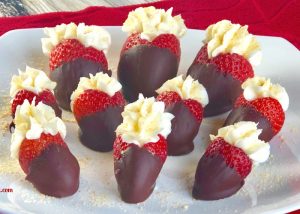 Choose a big chocolate cheesecake strawberry to enjoy.