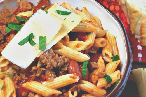 We make huge pots of this Pasta Fagioli during the cold weather months here in Kansas. There's truly not one thing that comforts my soul more than a bowl of this warming, delicious Italian soup.  #soup #Italian #OnePot #beef #sausage #pasta #comfortfood 