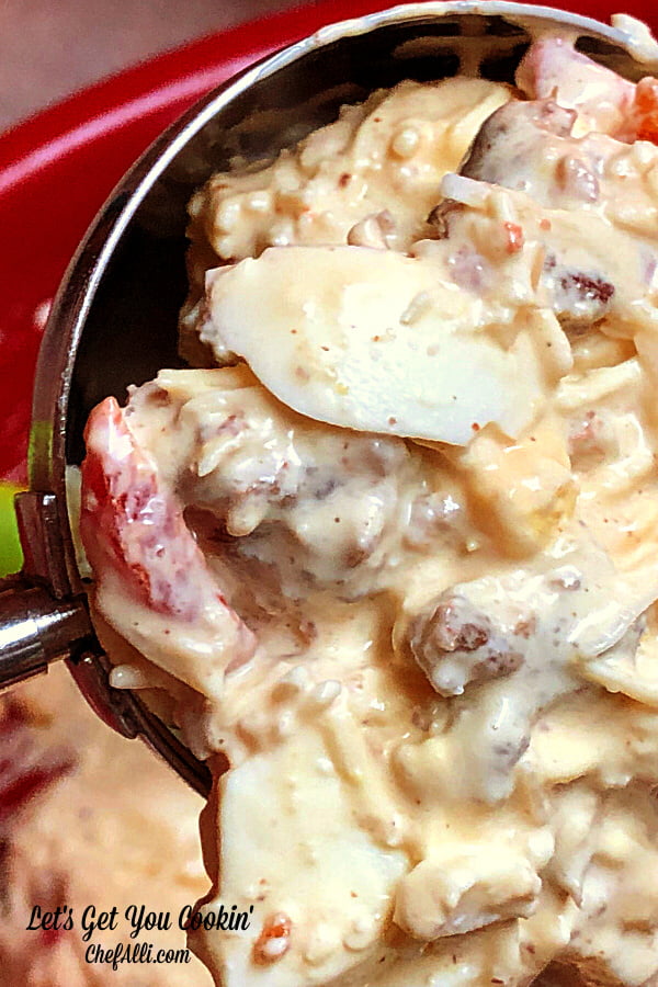 A scoop of the filling used to make Cowboy Breakfast Bites - eggs, cheese, and sausage.  