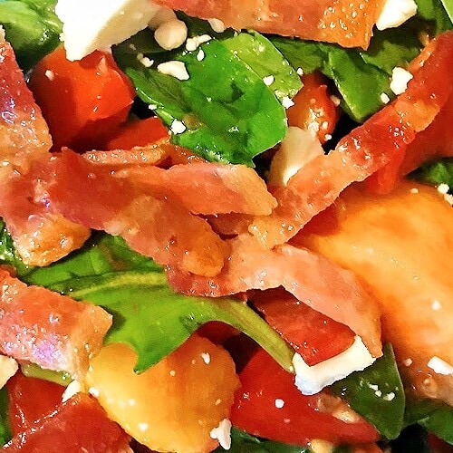 Bacon and Goat Cheese with Tomatoes and Peaches in a salad.