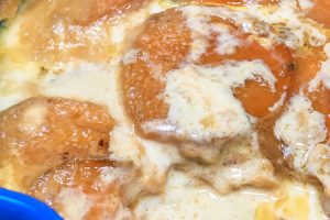 Sweet potatoes in a creamy au gratin sauce.