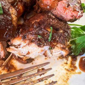 A sticky chicken thigh, tender and juicy.