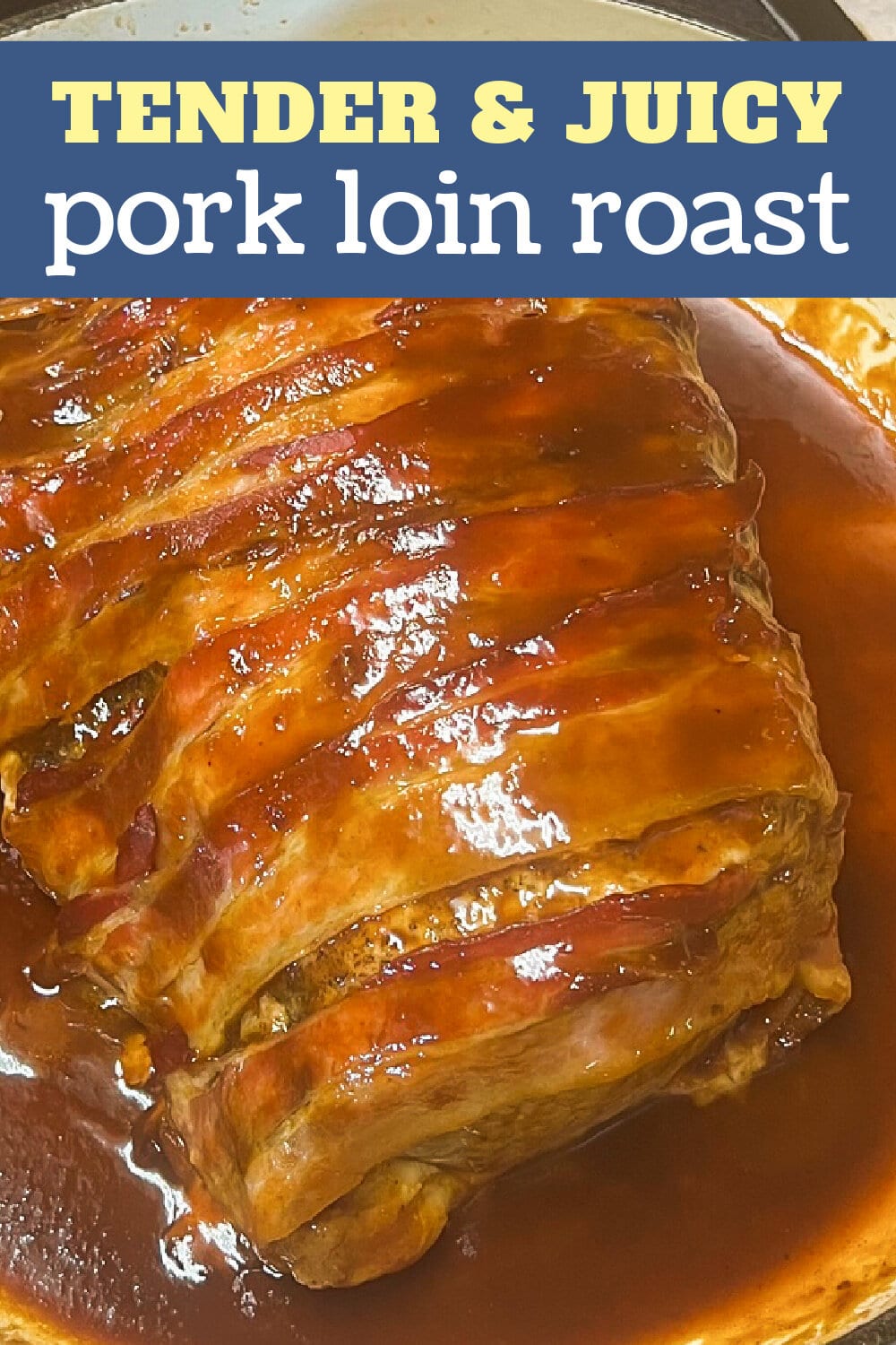 A bacon-wrapped pork loin roast slathered with sauce, ready to serve.