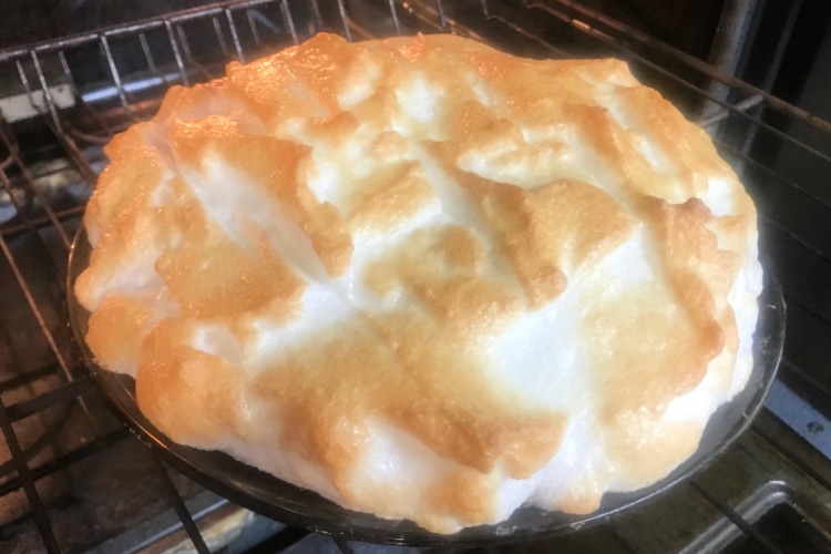 A beautiful lemon meringue pie fresh from the oven.