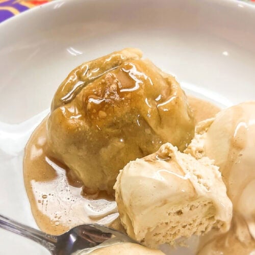 Easy old fashioned apple dumplings with a decadent sauce.