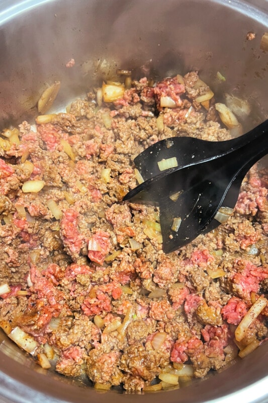 Ground beef cooking in a pot. 