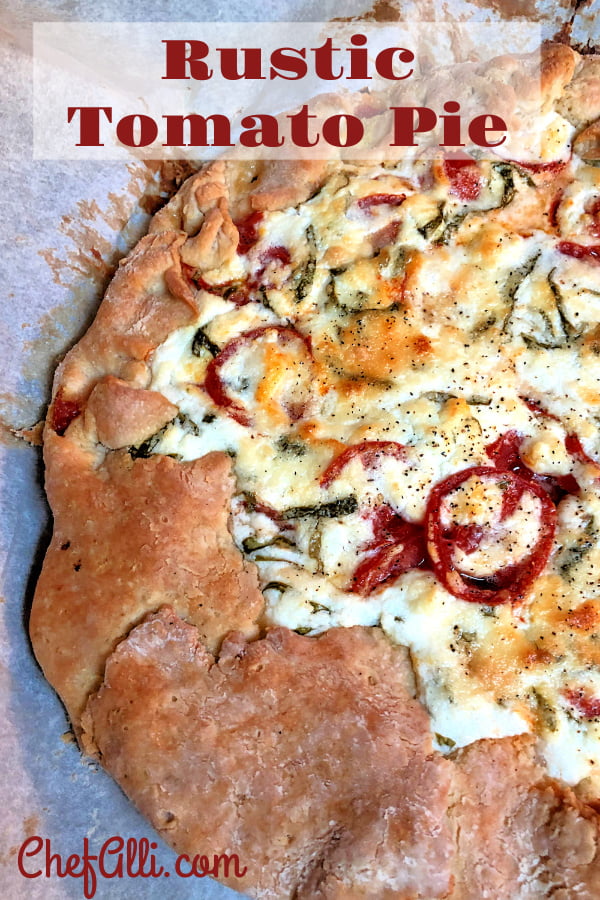 You have not lived until you've experienced Rustic Tomato Pie, and I'm not even kidding! One of our all-time favorite summer treats when homegrown tomatoes are in abundance, this tomato pie is like eating a heavenly cheese and tomato pizza; the combination of sweet tomatoes with the fresh basil and the goat cheese topping is completely mouth-watering. #TomatoPie #HomegrownTomatoes #Basil #GoatCheese