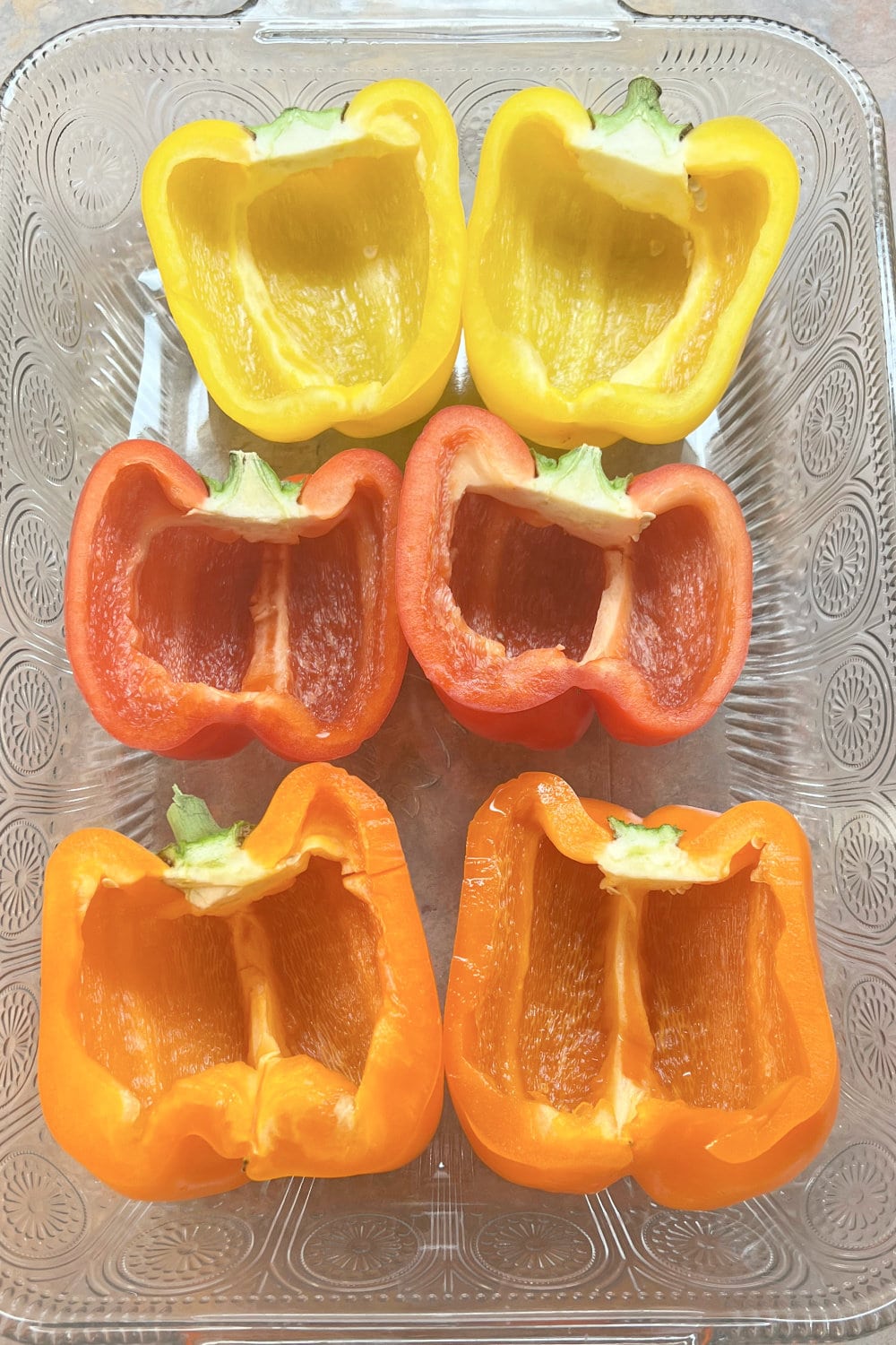 Bell pepper halves ready for the beef enchilada stuffing to be added.