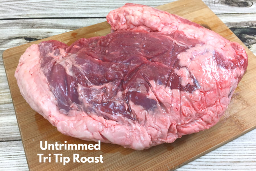 A tri tip roast needs some of the excess fat trimmed. 
