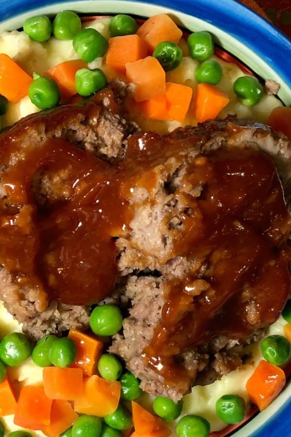 We're all familiar with the classic comfort food of meatloaf and mashed potatoes, and that's why your family is going to love One-Pot Meatloaf and Mashed Potatoes Supreme. All you need is ONE BITE and you'll be hooked! And if you've got any leftovers, be sure to make a grilled meatloaf sandwich for lunch the next day. #MeatLoaf #InstantPot #OnePotMeals 