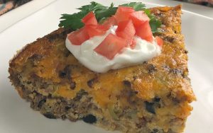 Are you looking for a delicious low-car crustless taco recipe idea?  This low-carb crustless Tex Mexican Taco pie is a family favorite!  I love how it slices up so nicely and makes a beautiful meal that tastes great!