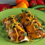These Chicken and Bacon Black Bean Enchiladas make a fun weeknight meal and I love to double this recipe to make TWO pans - one for dinner now and one for dinner later....then I pull that sucker right out of the freezer. And, this casserole makes a pretty neat gift when somebody's grieving a loss or celebrating a birth - who doesn't love a pan of enchiladas delivered to their door when in need??   #chicken #bacon #enchiladas #casserole