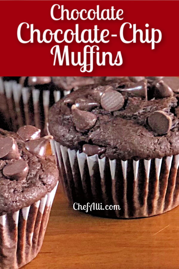 Chocolate chocolate-chip muffins on a platter. 