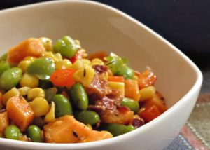 A bowl full of delicious color - Crispy Bacon and Sweet Potato Hash.