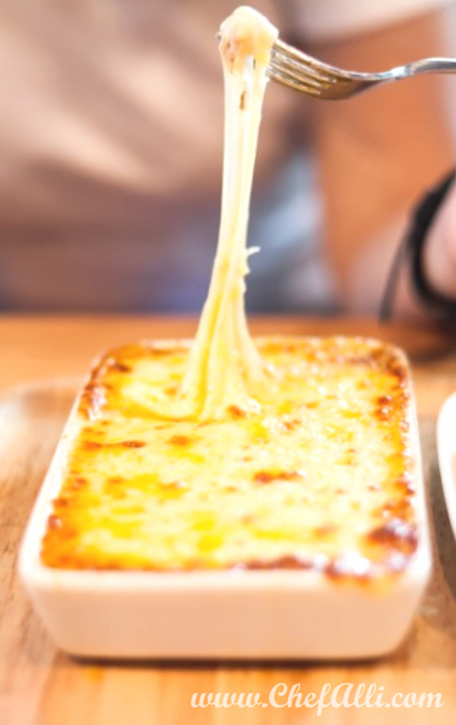 Amazing. Creamy goat cheese folded together with shredded Parmesan, fresh herbs, sundried tomatoes, and roasted garlic then baked until bubbly... Need I say more?