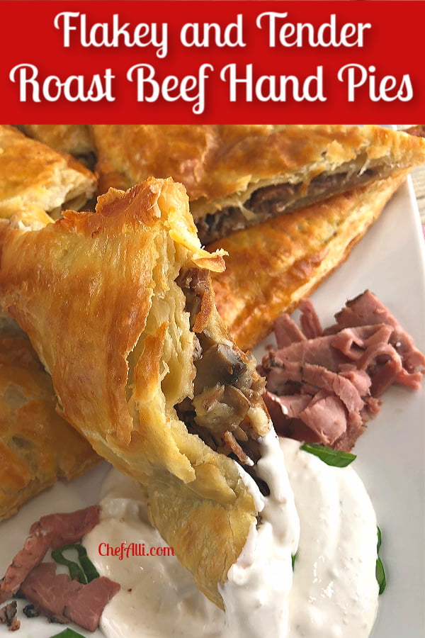 Roast Beef Welling Packets on a platter with horseradish sauce. 