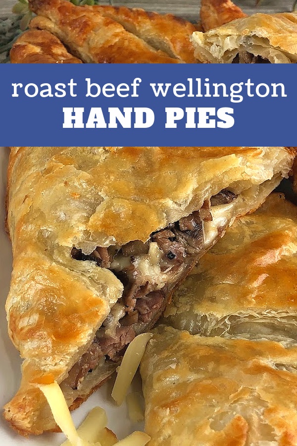 Roast Beef Wellington packets stuffed with roast beef and Swiss cheese, then baked until golden brown. 