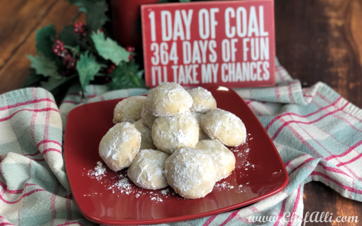 If you're not familiar with Russian Tea Cakes, don't be misled by the title. You will love how these little puffs of sweetness are a delightful little cookie, rolled in powdered sugar and perfect for your Christmas dessert table. They're also so easy to make, that even the smallest helpers can take part! 