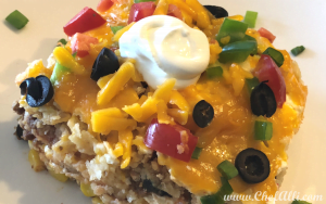 Oh my gosh, my guys LOVED this beefy Tex Mex Cowboy Casserole. It really brought out the Cowboy in them! This easy casserole is packed with Tex Mex flavors and textures, from the smooth sour cream to the crunchy tortilla chips. My family loved it, and I know yours will, too! #casserole #weeknightdinner #texmexrecipe
