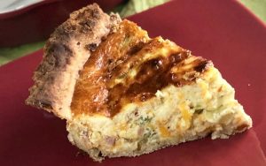 Who loves breakfast quiche for any meal of the day??  If you raised your hand, then you definitely need this quiche recipe.  My family scarfed it right down! This Easy Deep Dish Ham and Broccoli Quiche is incredibly delicious and such an easy recipe to whip up.  You only need a few basic ingredients on hand....eggs, cream, broccoli, and ham and you've got a meal all ready to hit the dinner table. #Breakfast #Brunch #Ham #Bacon #EasyMeal #Eggs #Cheddar