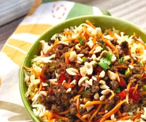Asian beef bowl with vegetable slaw.