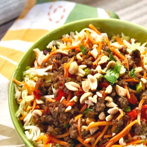 Asian beef bowl with vegetable slaw.