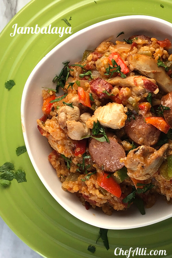 Who wants to spice up the ole dinner menu?  I sure do! This Instant Pot Jambalaya Recipe does the trick and it's full of sausage, shrimp, rice and veggies - super fast comfort food that's oh-so-easy to make. 