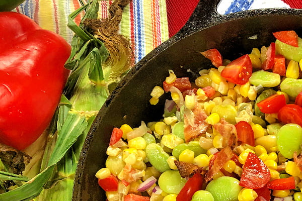 Cajun Sweet Corn Medley (aka Maque Choux in the deep South) is a traditional summer side dish that combines sweet corn and vegetables with BACON to make a tasty and colorful addition to any meal.