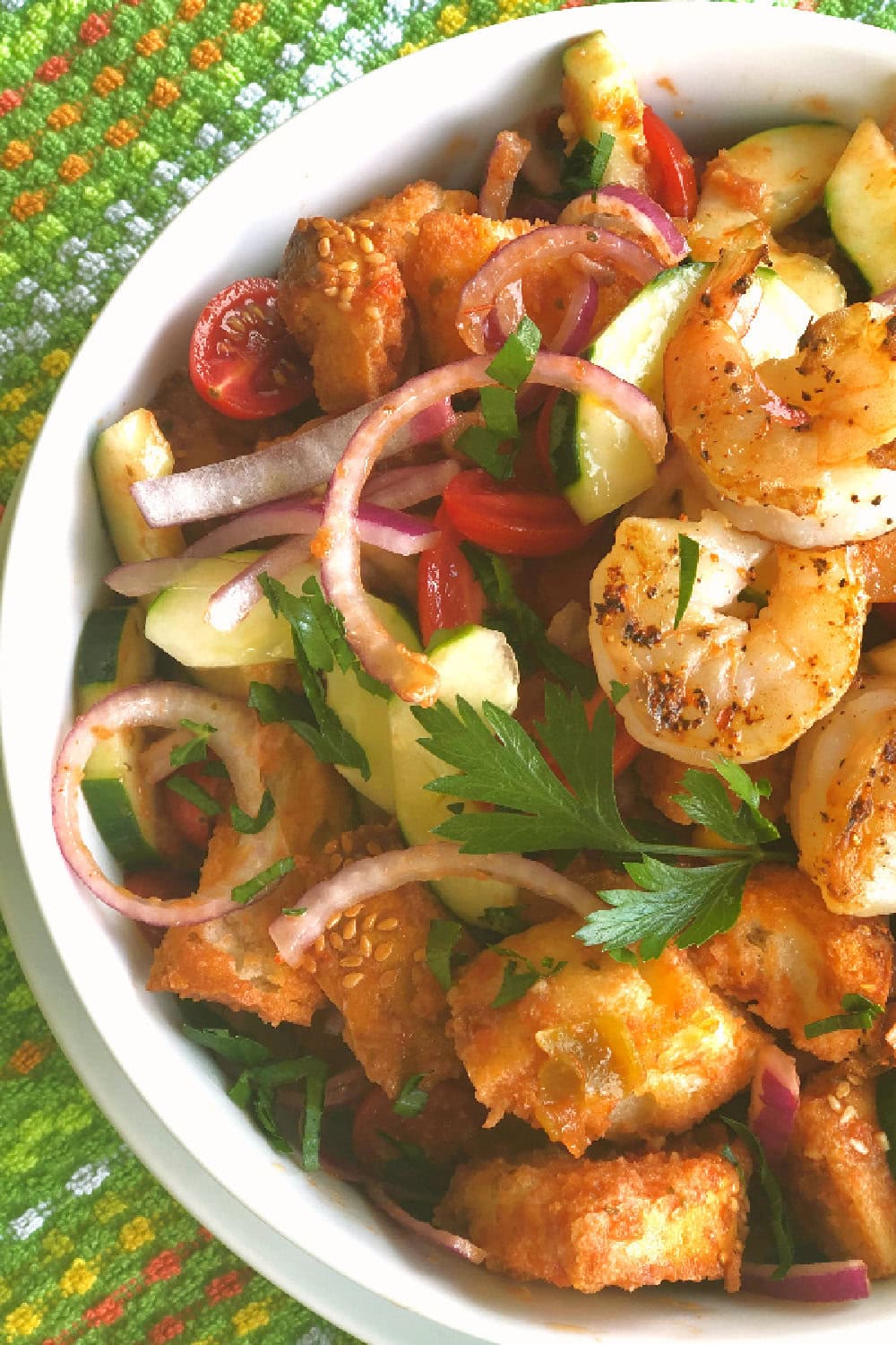 Panzanella made with steak and shrimp with a Mexican twist.