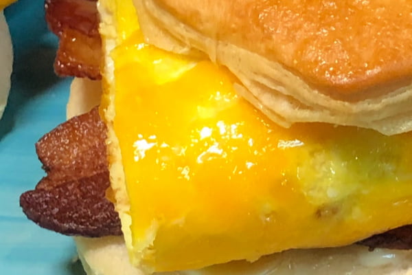 When it comes to breakfast, what's better than a warm, yummy Bacon, Egg and Cheese Biscuit Sandwich? Having these on hand to pull out of the freezer and pop into the oven on busy school mornings has saved my bacon more times than I can even say.