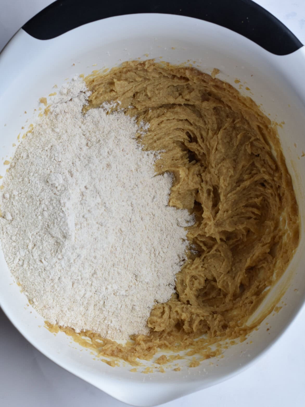 Batter with graham cracker crumbs. 