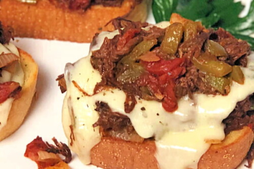 Yay! Here's another easy weeknight dinner your family will go crazy for: Open-Face Italian Beef Sandwiches. This ground beef version of an Italian Classic is flavorful and fast - my guys gave them a giant "thumbs up", thankfully. These oven-baked sandwiches are also a big hit for watch parties on game day, as well.  #ItalianBeef #SubSandwiches  #OvenBaked  #GroundBeef #EatBeef #SpeedyMeal #Easy #Sandwiches