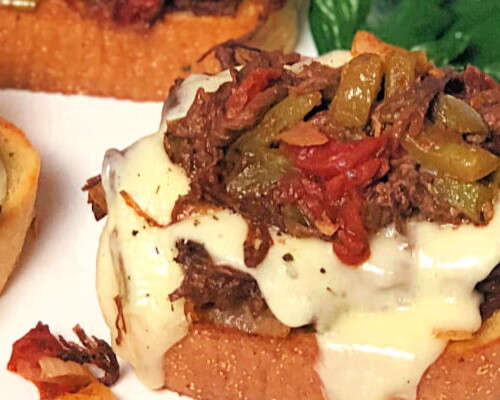 Yay! Here's another easy weeknight dinner your family will go crazy for: Open-Face Italian Beef Sandwiches. This ground beef version of an Italian Classic is flavorful and fast - my guys gave them a giant "thumbs up", thankfully. These oven-baked sandwiches are also a big hit for watch parties on game day, as well.  #ItalianBeef #SubSandwiches  #OvenBaked  #GroundBeef #EatBeef #SpeedyMeal #Easy #Sandwiches