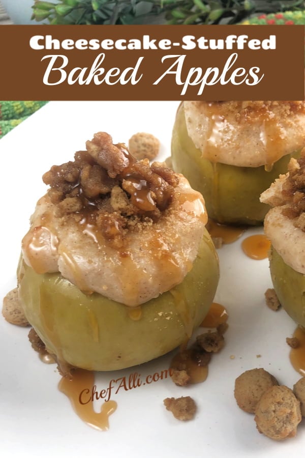 Cheesecake-stuffed baked apples with crumble topping, drizzled with caramel sauce, sitting on a white plate.