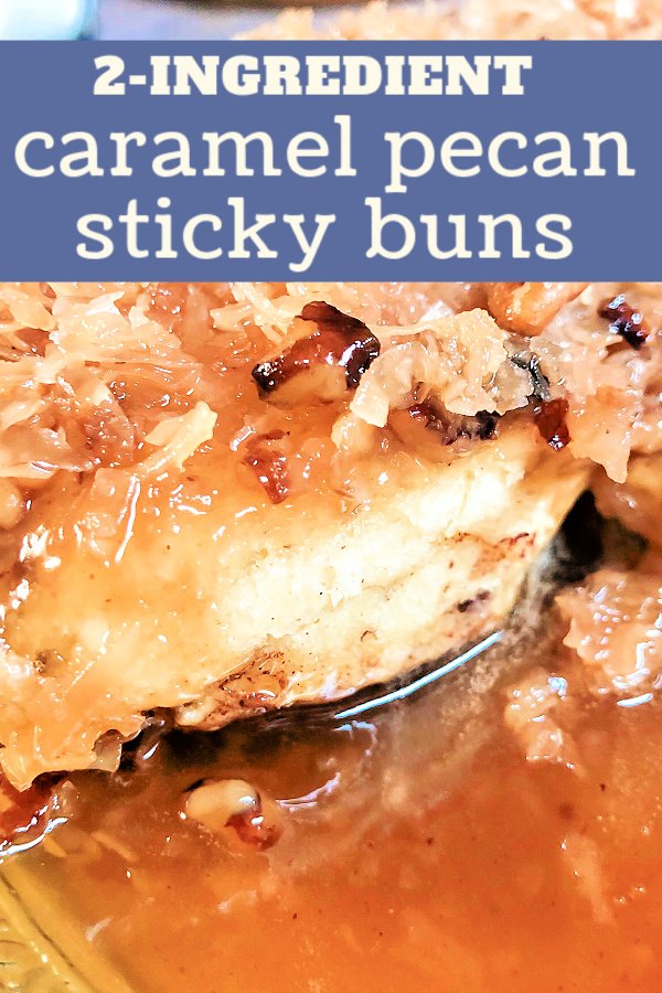 A sticky bun with caramel syrup topped with pecan an coconut. 