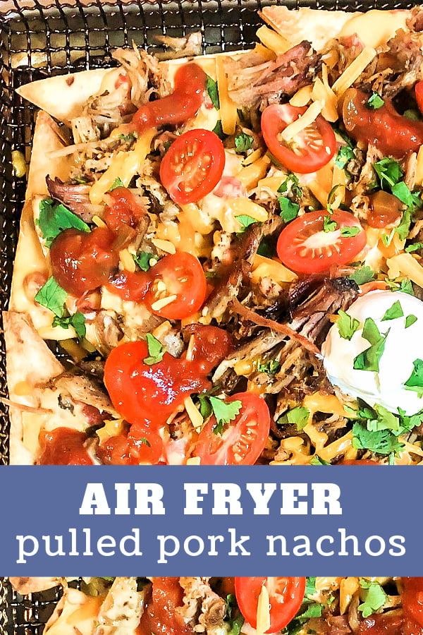 A big batch of Pulled Pork Nachos with Mexican-inspired toppings. 