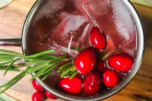 Overhead shot of a beautiful Cranberry Moscow Mule cocktail.