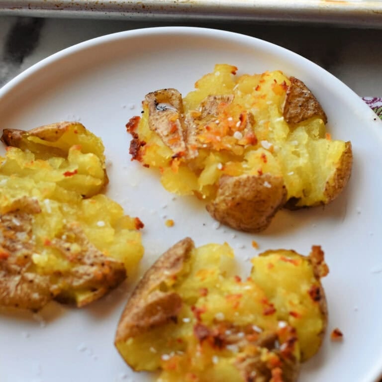 Crispy smashed potatoes made in the oven.
