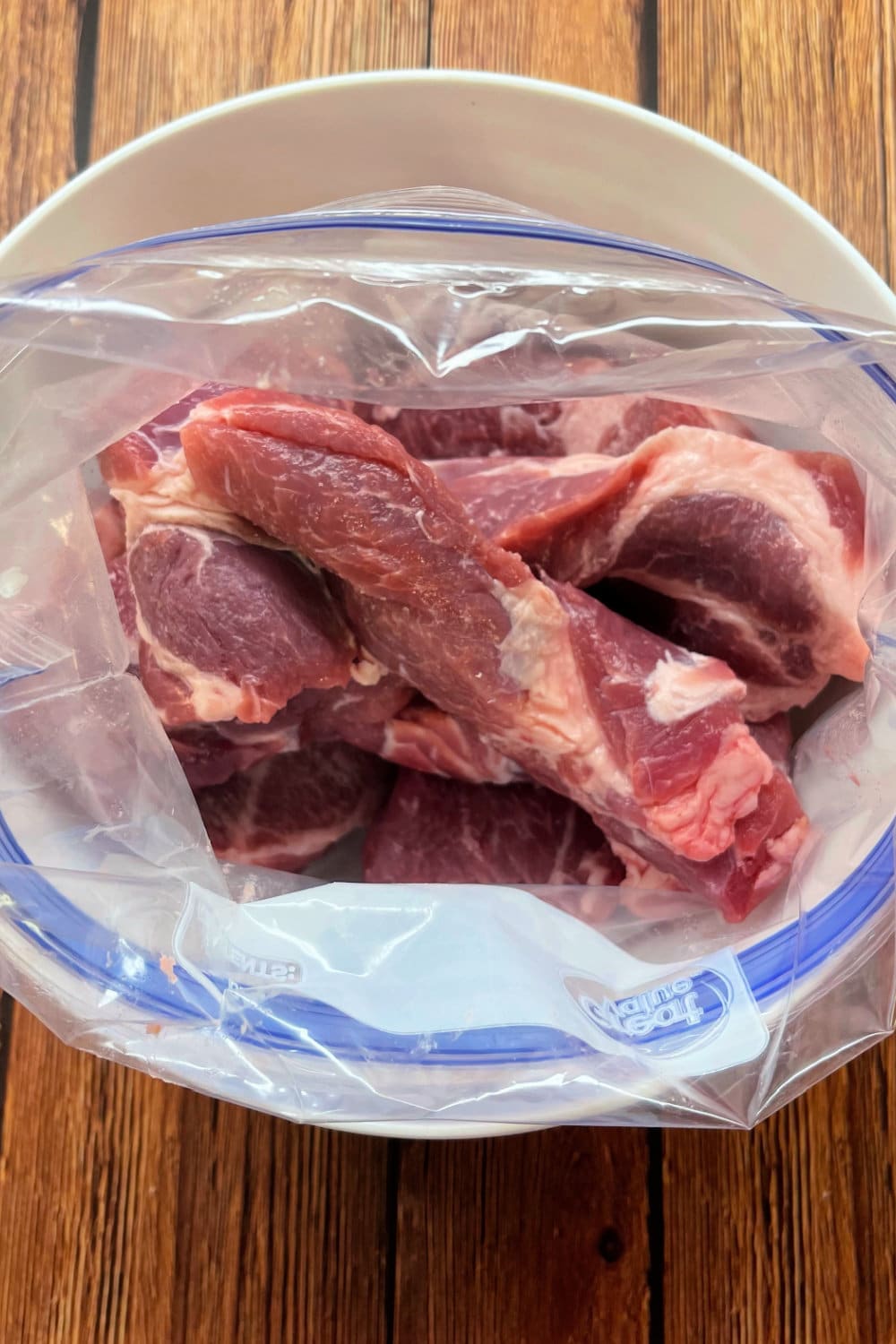 Country-style ribs in a gallon bag, ready for the marinade. 