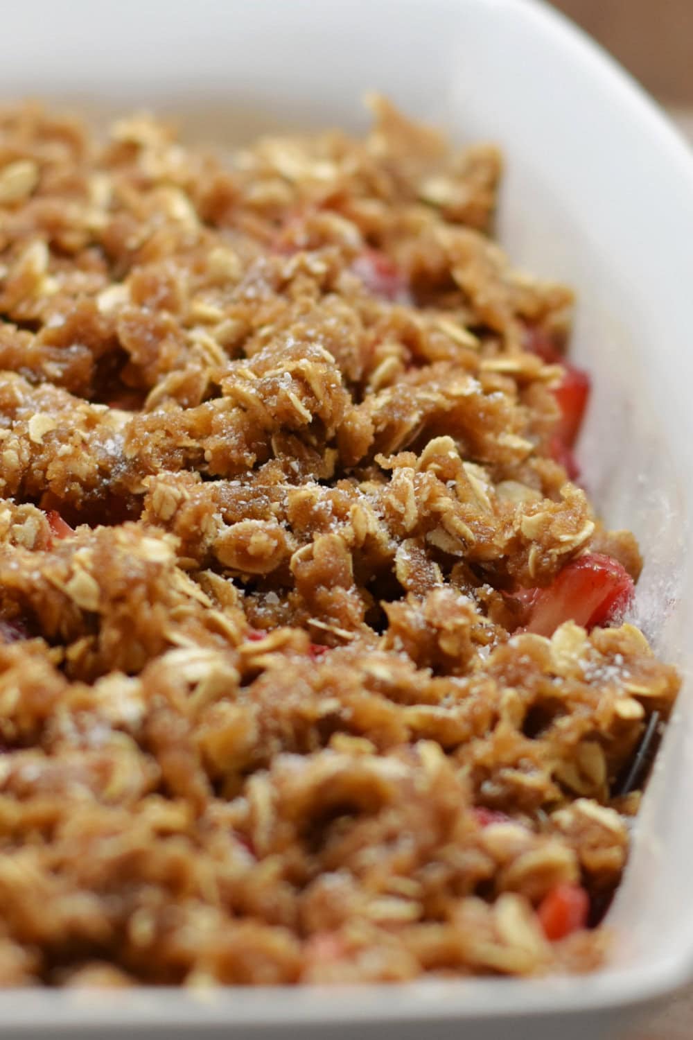 Crumbled brown sugar and oat topping over the fresh strawberries. 