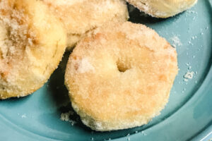 Air Fryer Sugar Doughnuts served up on a plate.