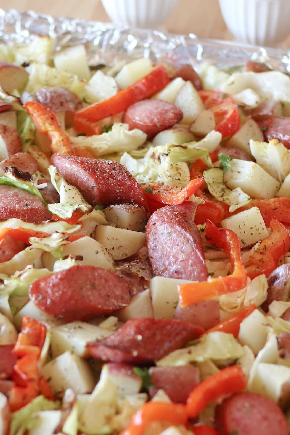 A fully cooked Sausage, Cabbage, and Potato Sheet Pan Meal. 