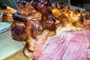 Bone-in ham with a sticky glaze.