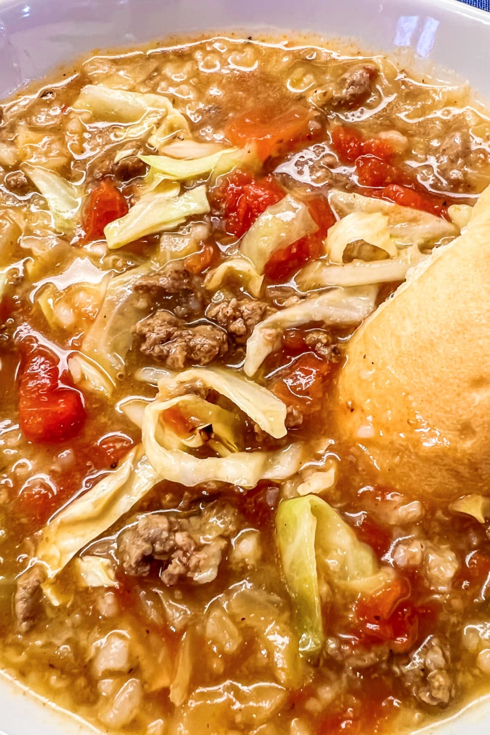 A big white bowl loaded with hot Cabbage Roll Soup. 