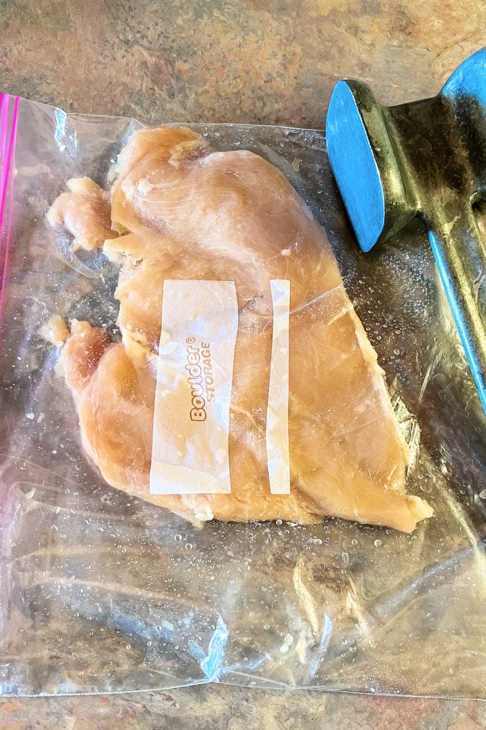 A flattened boneless, skinless chicken breast. 