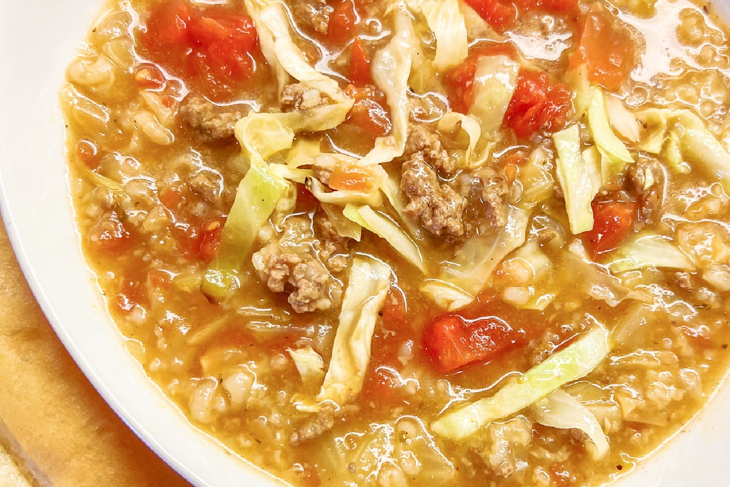 Cabbage Roll Soup with ground beef, tomatoes, and cabbage in a savory broth. 