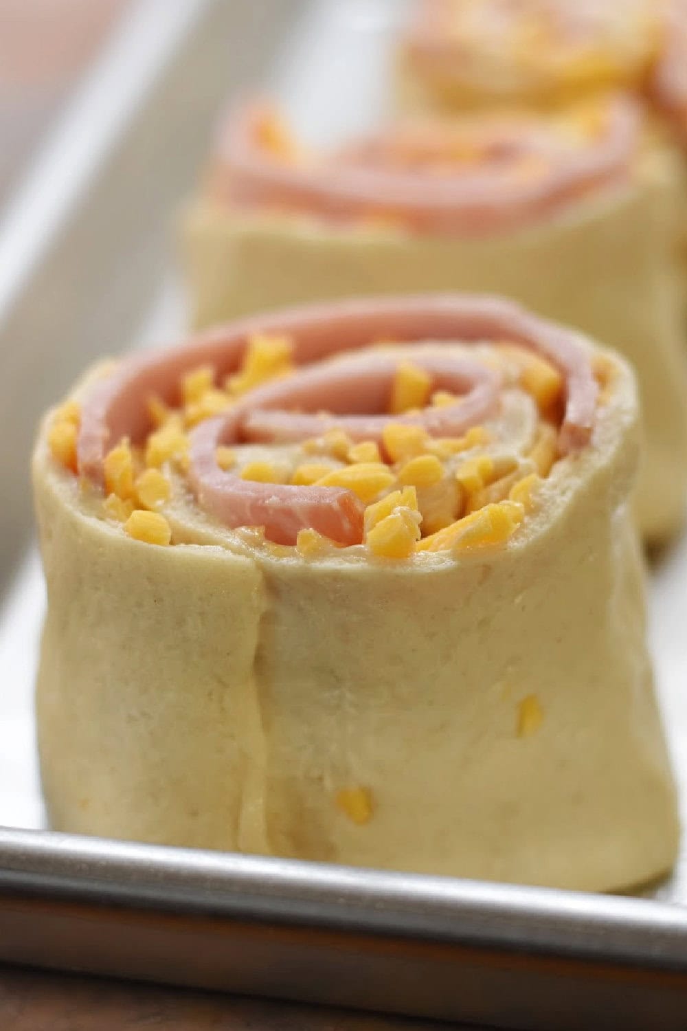 Ham and cheese rolls ready to bake. 