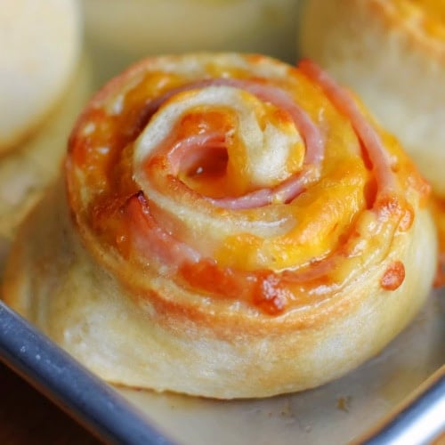 Freshly baked Ham and Cheese Roll on the baking sheet.