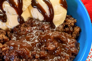 Ooey Gooey Warm Brownie Cobbler with Ice Cream.