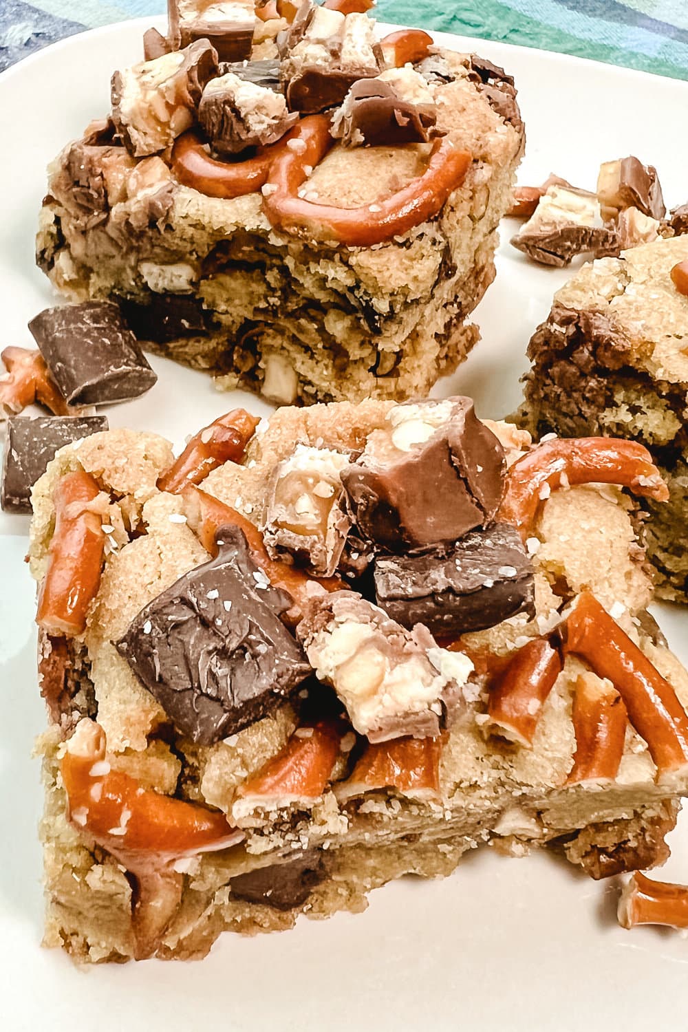 Chocolate Chunk Cookie Bars on a white serving plate. 